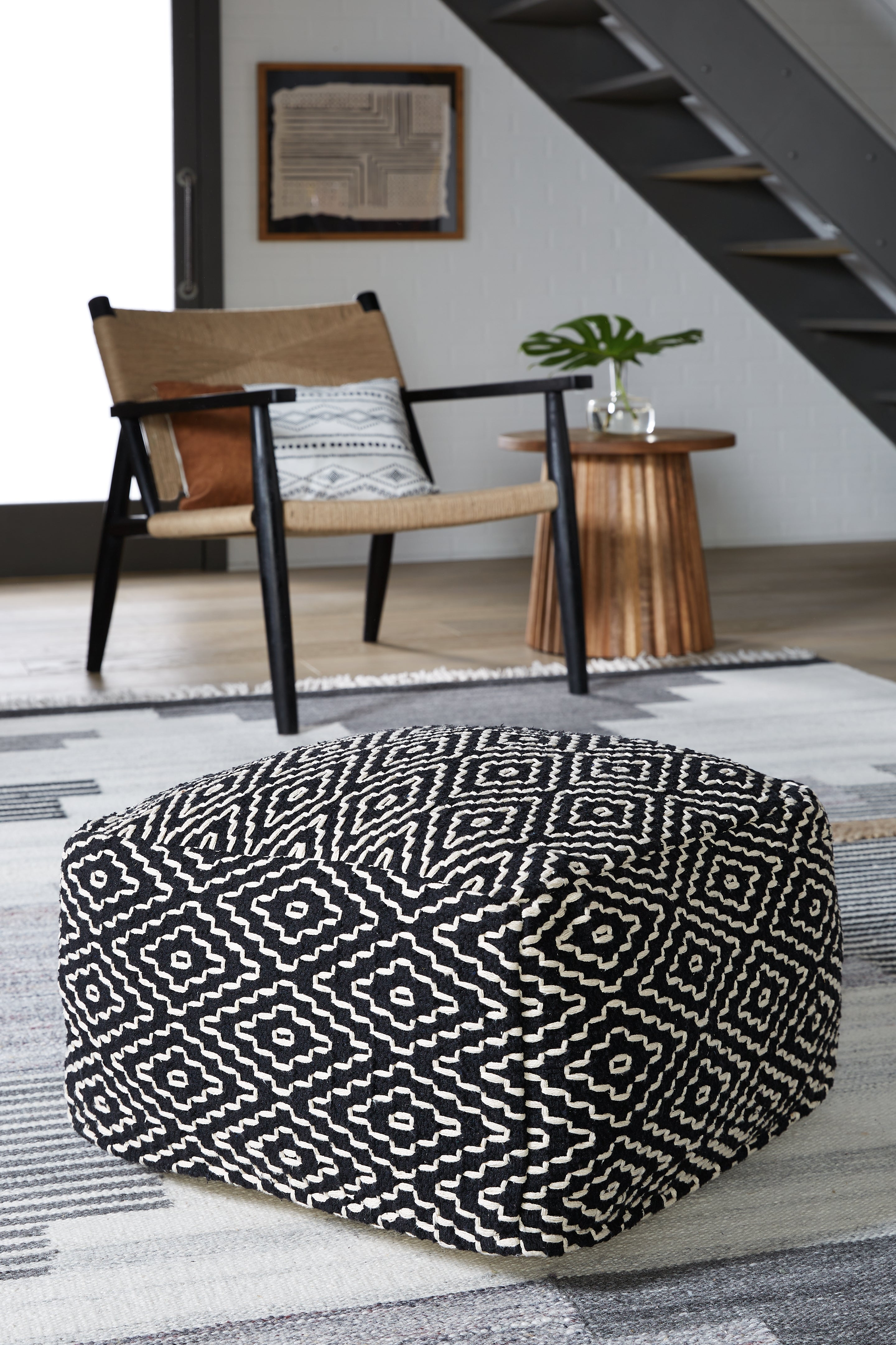 Coral Furniture - Ashley Furniture - Jasett Pouf - Pouf / Black/Ivory - A1001058