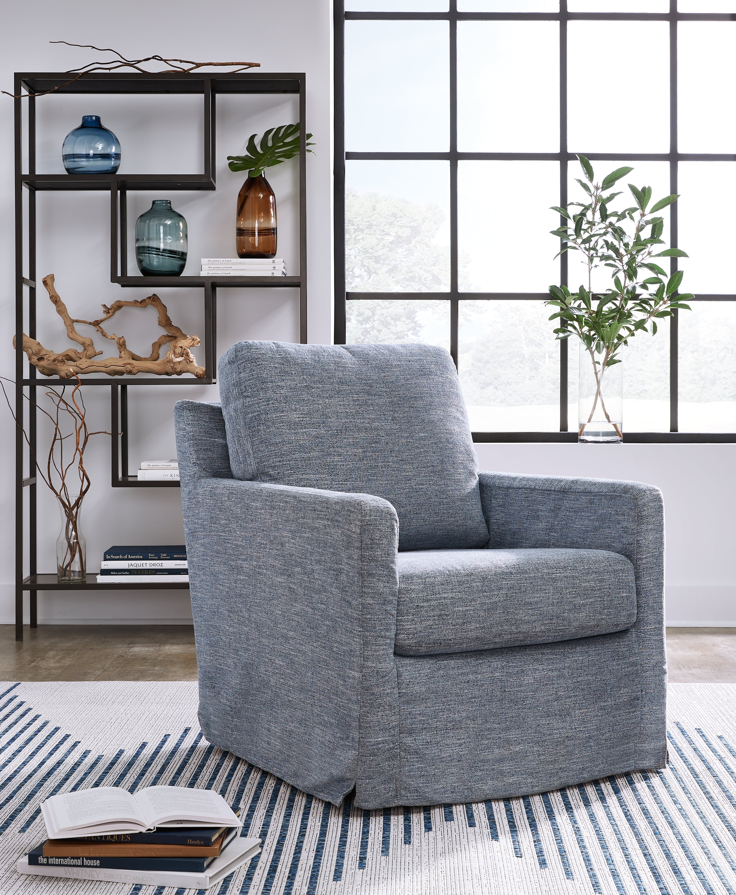 Coral Furniture - Ashley Furniture - Nenana Next-Gen Nuvella Swivel Glider Accent Chair - Swivel Glider Accent Chair / Denim - A3000646