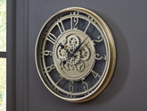 Coral Furniture - Ashley Furniture - Gilover Wall Decor - Wall Clock / Champagne Finish - A8010386