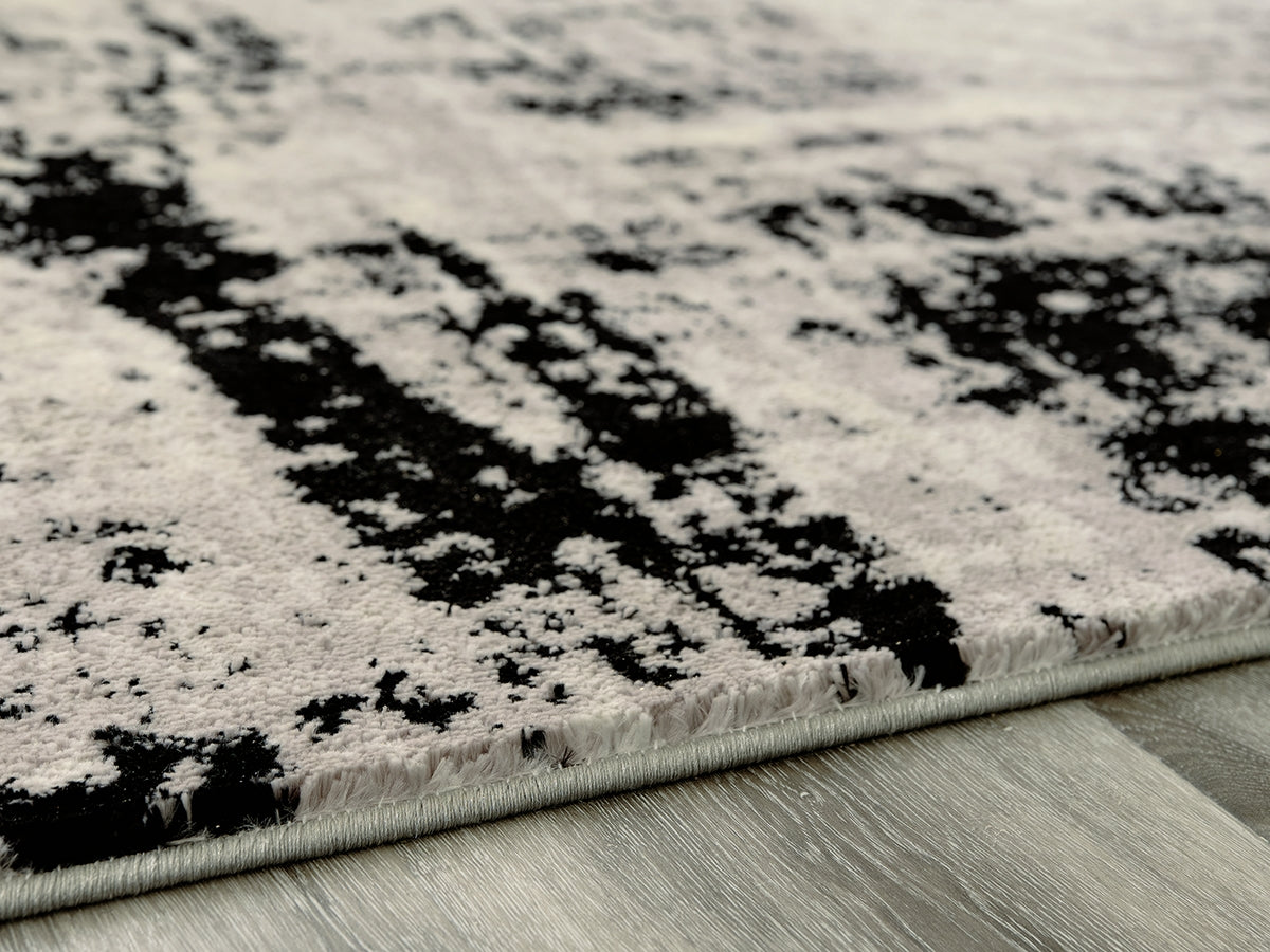 Coral Furniture - Ashley Furniture - Zekeman Rug - 7'10" x 10' Rug / Black/Cream/Gray - R404921