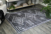 Coral Furniture - Ashley Furniture - Arloman Rug - 5' x 7' Washable Rug / Black/Cream/Gray - R405932