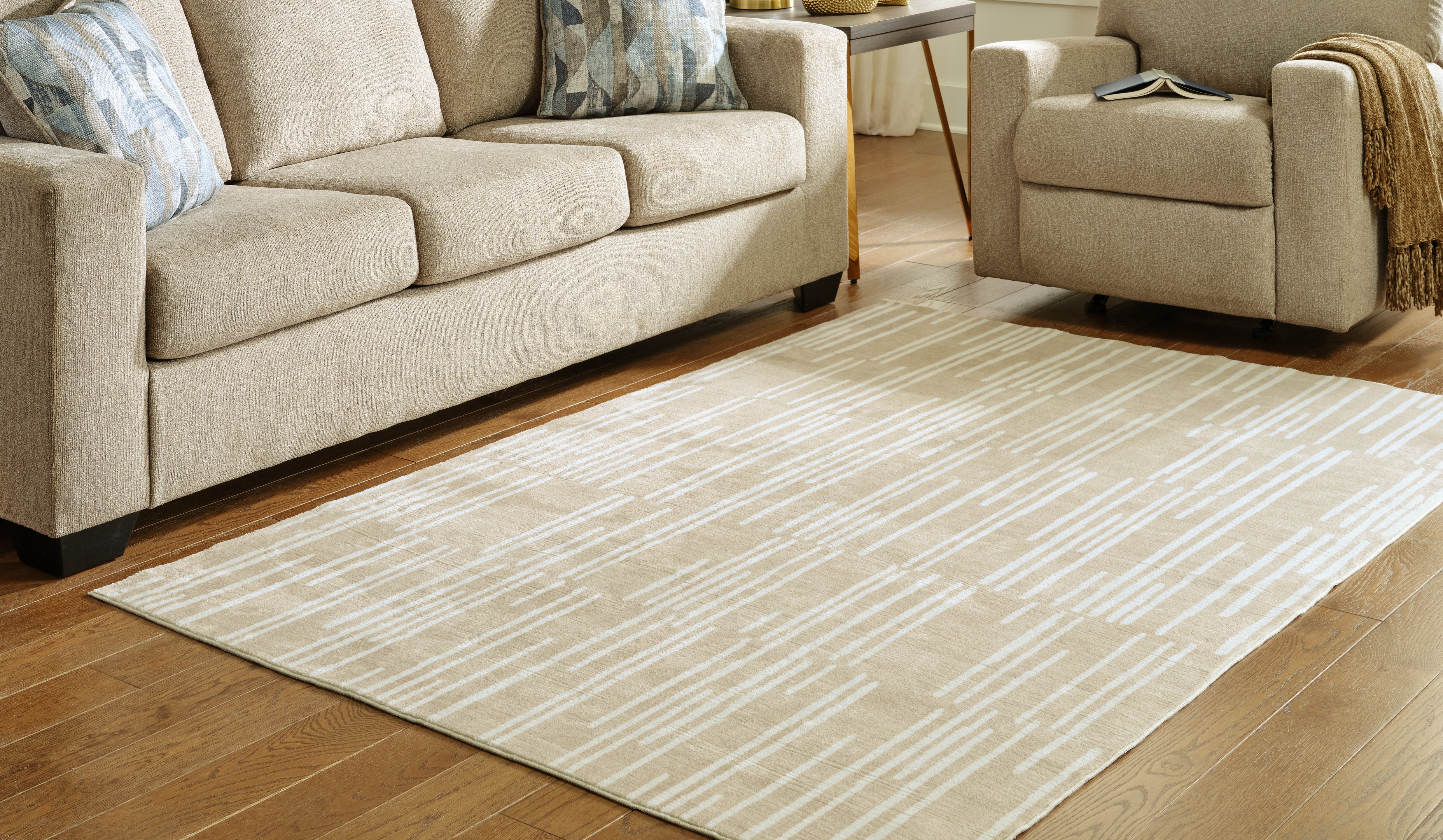 Coral Furniture - Ashley Furniture - Ardenville Rug - 5' x 7'1" Washable Rug / Tan/Cream - R406212