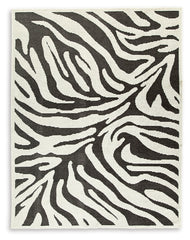 Coral Furniture - Ashley Furniture - Thomwith Rug - 8' x 10'2" Washable Rug / Black/Ivory - R406291