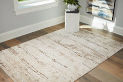 Coral Furniture - Ashley Furniture - Kasney Rug - 8' x 10' Rug / Cream/Brown - R406851