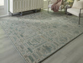 Coral Furniture - Ashley Furniture - Jossland Rug - 5' x 7' Rug / Green/Ivory - R406912