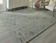 Coral Furniture - Ashley Furniture - Jossland Rug - 5' x 7' Rug / Green/Ivory - R406912