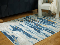 Coral Furniture - Ashley Furniture - Vinlett Rug - 5' x 7' Washable Rug / Cream/Blue/Brown - R407042