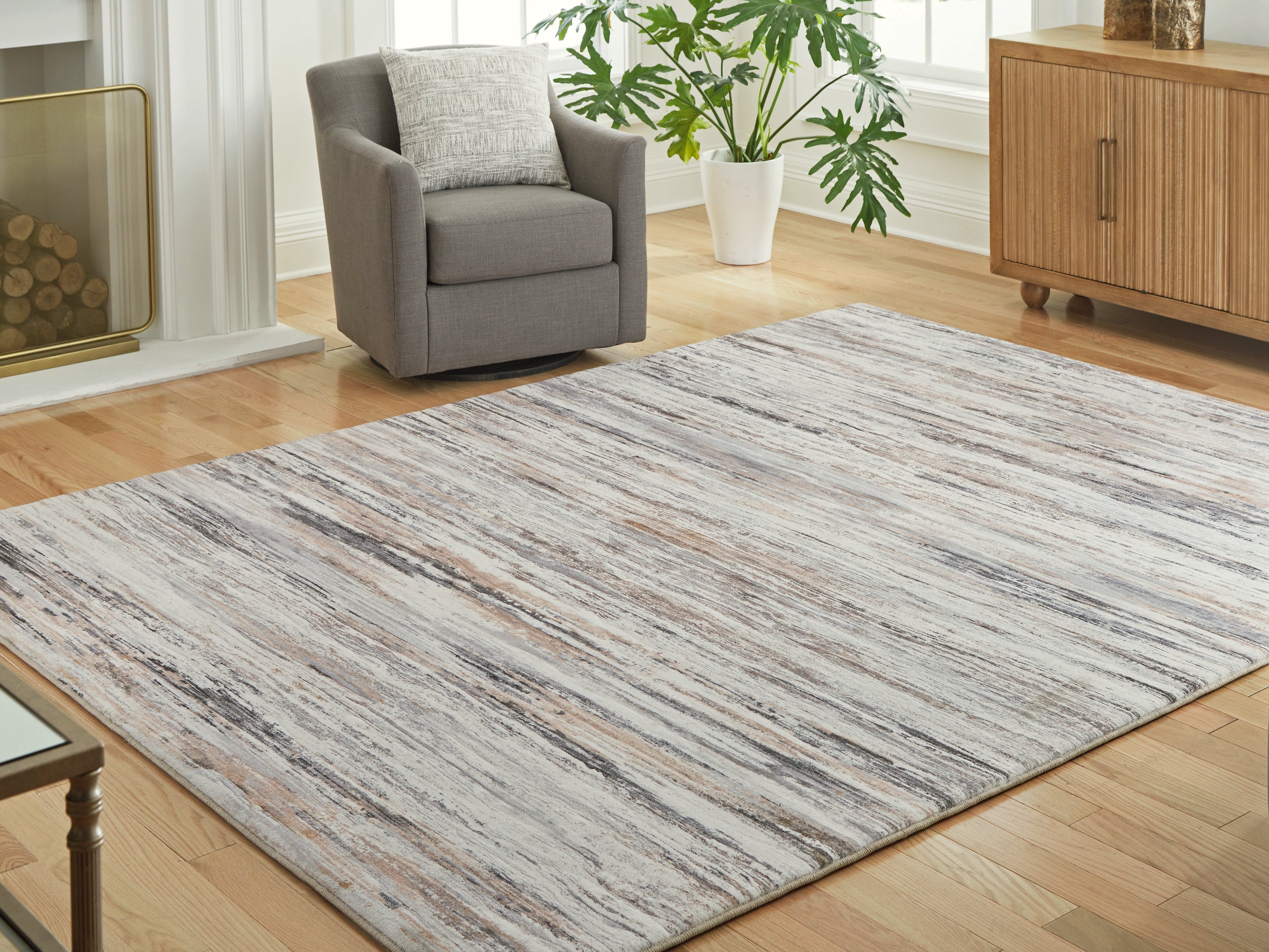 Coral Furniture - Ashley Furniture - Nace Rug - 5' x 7' Area Rug / Gray/Brown/White - R407472