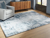 Coral Furniture - Ashley Furniture - Arlenmont Rug - 5' x 7' Area Rug / Blue/White/Brown - R407482
