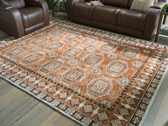 Coral Furniture - Ashley Furniture - Qaabiz Rug - 5' x 7' Area Rug / Sienna/Ivory/Black - R407522