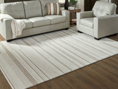 Coral Furniture - Ashley Furniture - Gadence Rug - 5' x 7' Area Rug / Ivory/Tan - R407642