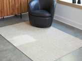 Coral Furniture - Ashley Furniture - Wolbert Rug - 5' x 7' Area Rug / Tan/Ivory - R407662