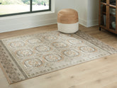 Coral Furniture - Ashley Furniture - Bachby Rug - 7'10" x 10' Area Rug / Multi - R407681