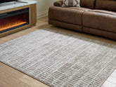 Coral Furniture - Ashley Furniture - Fuadwick Rug - 7'10" x 10' Area Rug / Multi - R407691