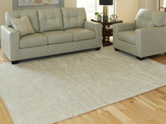 Coral Furniture - Ashley Furniture - Jaseena Rug - 5' x 7' Area Rug / Beige/Tan - R407722