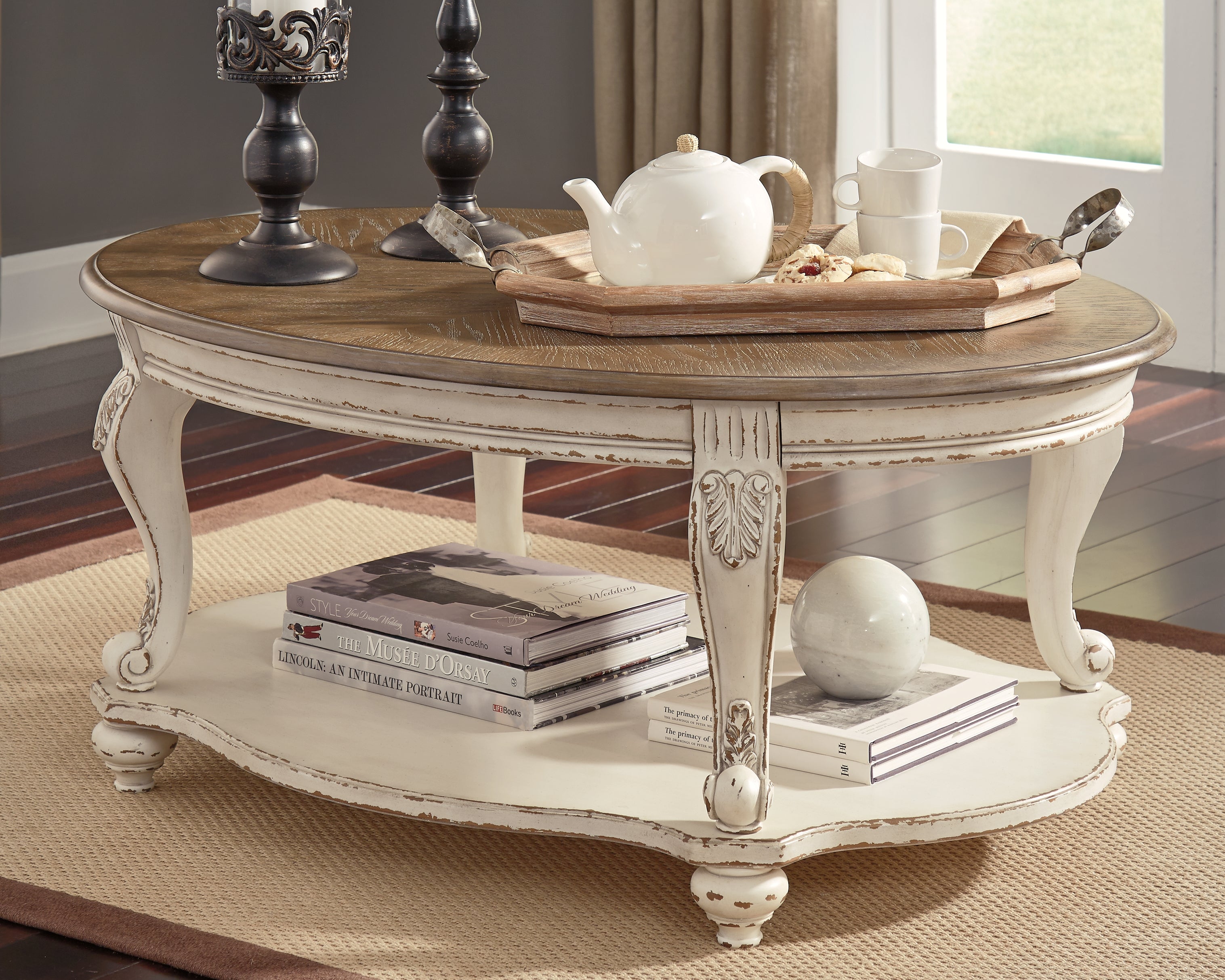 Coral Furniture - Ashley Furniture - Realyn Coffee Table - Oval Cocktail Table / White/Brown - T743-0