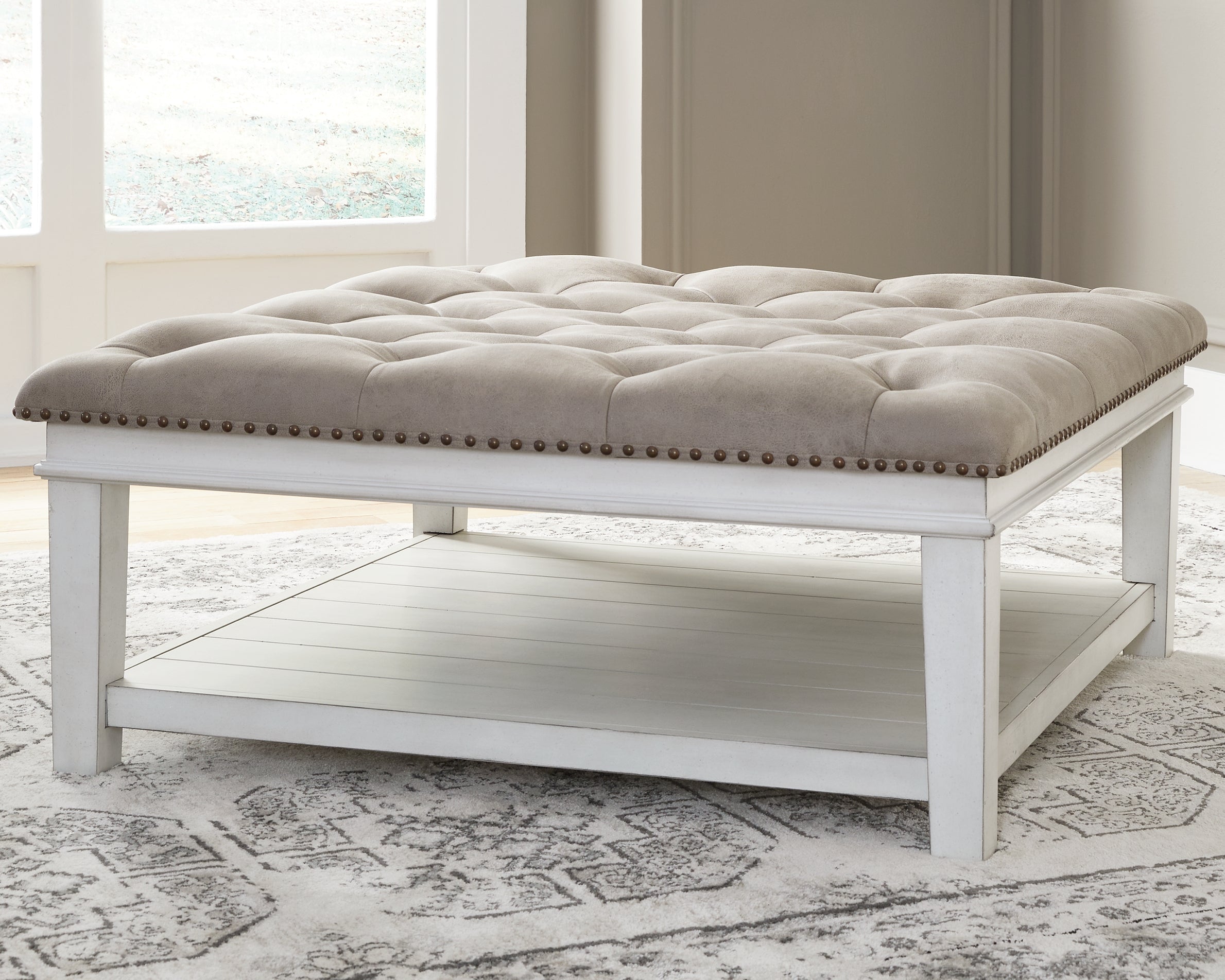 Coral Furniture - Ashley Furniture - Kanwyn Upholstered Ottoman Coffee Table - UPH Ottoman Cocktail Table / Whitewash - T937-21