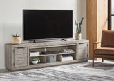 Coral Furniture - Ashley Furniture - Naydell 92" TV Stand - 92" / Gray - W996-78