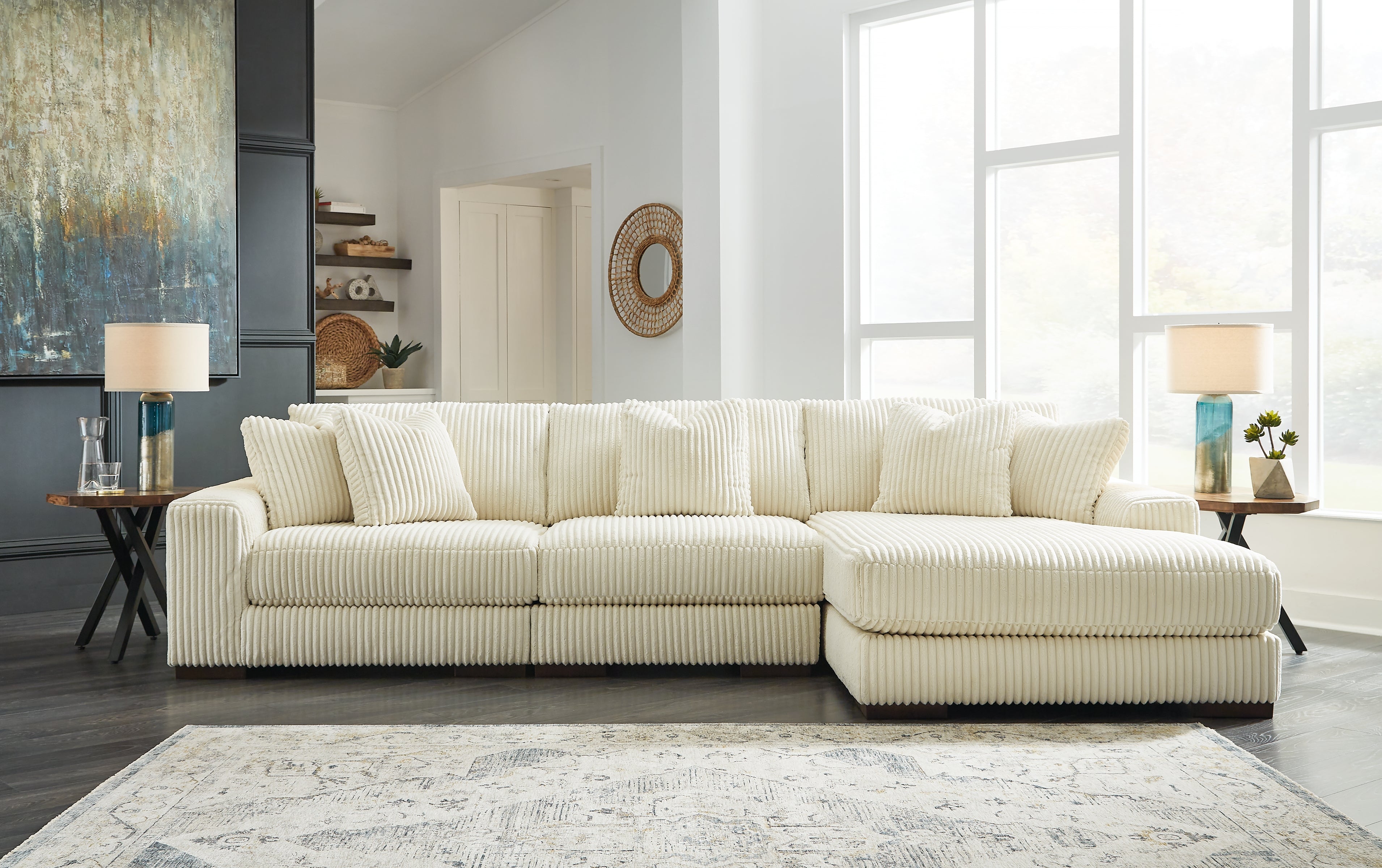 Coral Furniture - Ashley Furniture - Lindyn Sectional - RAF 3-Piece Sectional with Chaise / Ivory - 21104S12