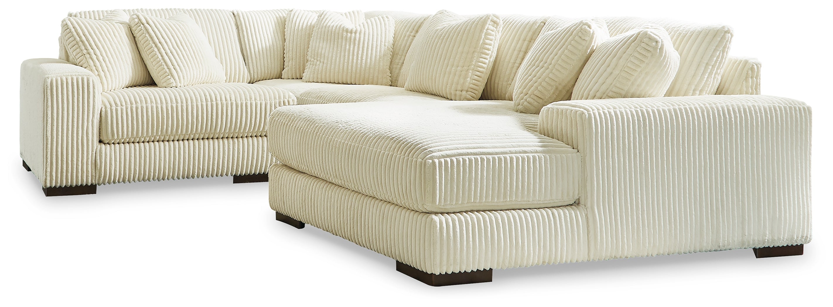Coral Furniture - Ashley Furniture - Lindyn Sectional - RAF 4-Piece Sectional with Chaise / Ivory - 21104S15