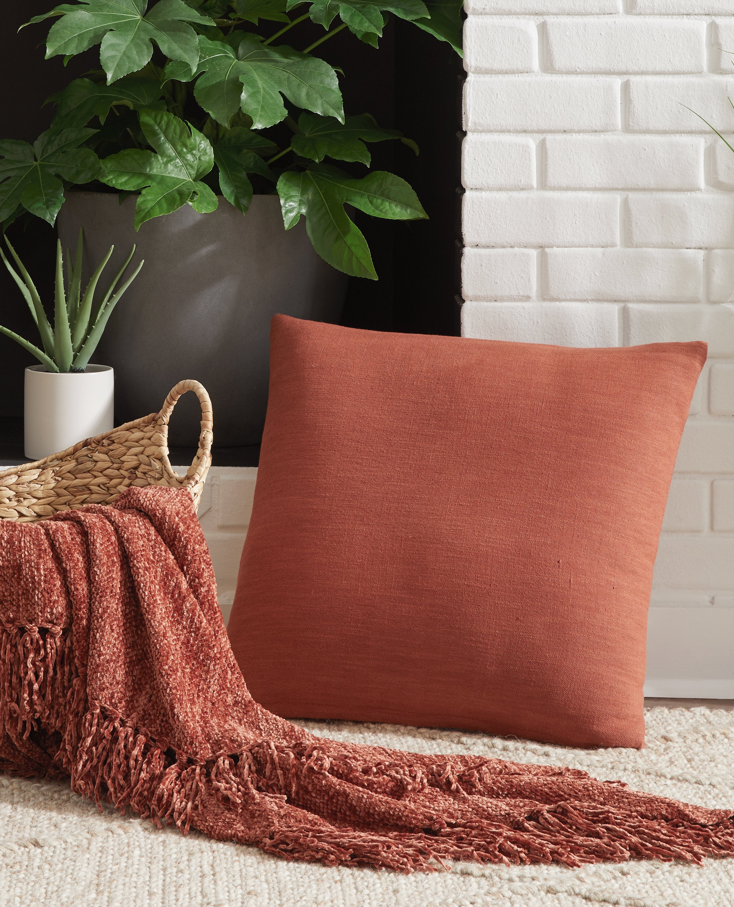 Coral Furniture - Ashley Furniture - Thaneville Pillows - Pillow / Rust - A1001043P