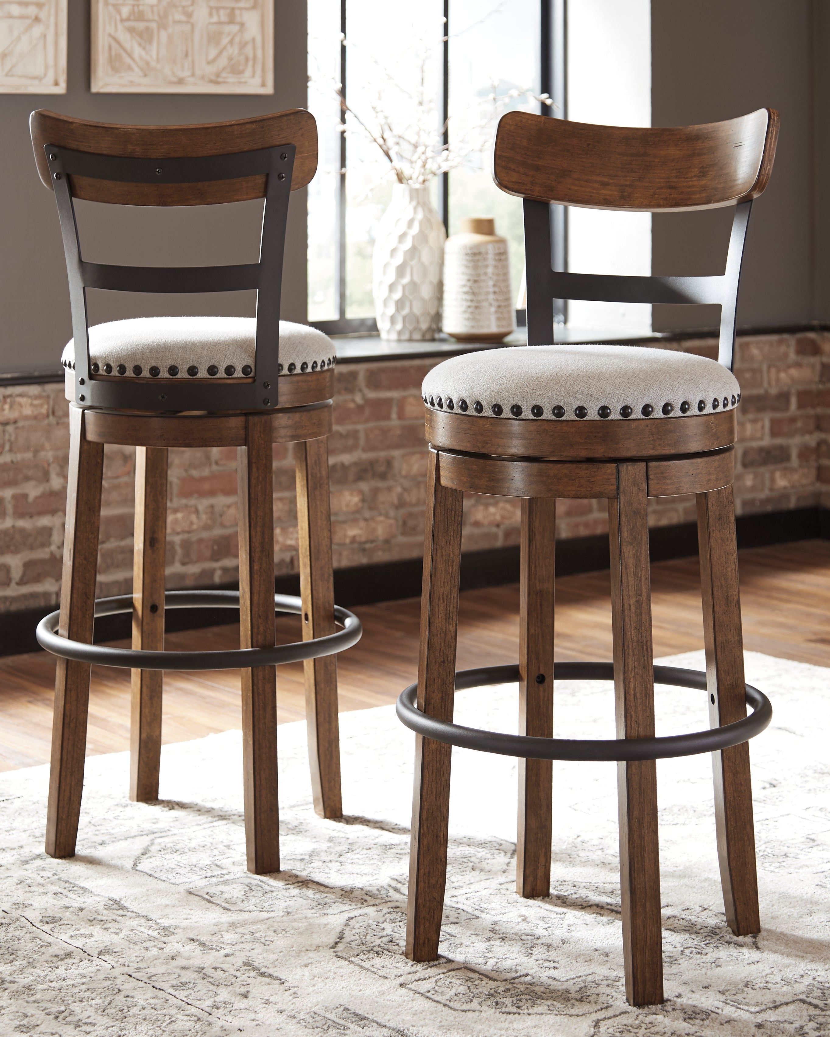 Coral Furniture - Ashley Furniture - Valebeck Dining Room - Tall UPH Swivel Barstool(1/CN) / Brown - D546-430
