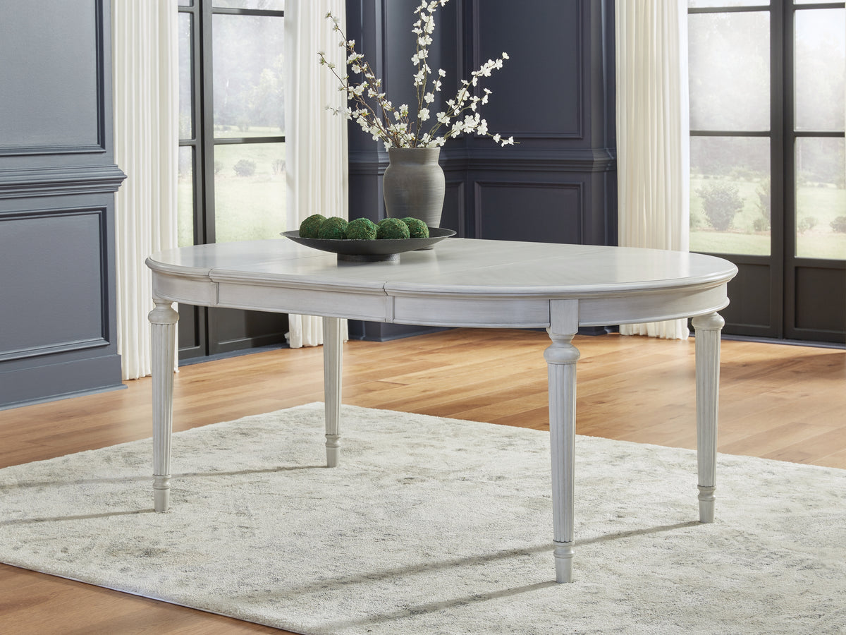 Coral Furniture - Ashley Furniture - Montelaine Dining Room - Oval Dining Room EXT Table / Antique White - D795-35