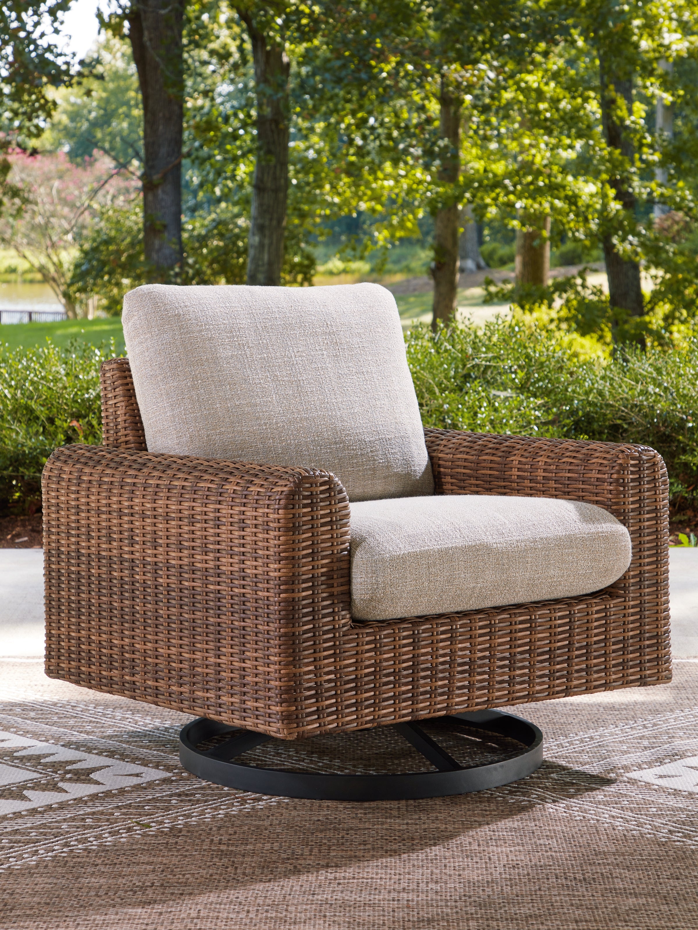 Coral Furniture - Ashley Furniture - Dolan Creek Outdoor - Swivel Lounge w/ Cushion / Gray/Brown - PCP610-821