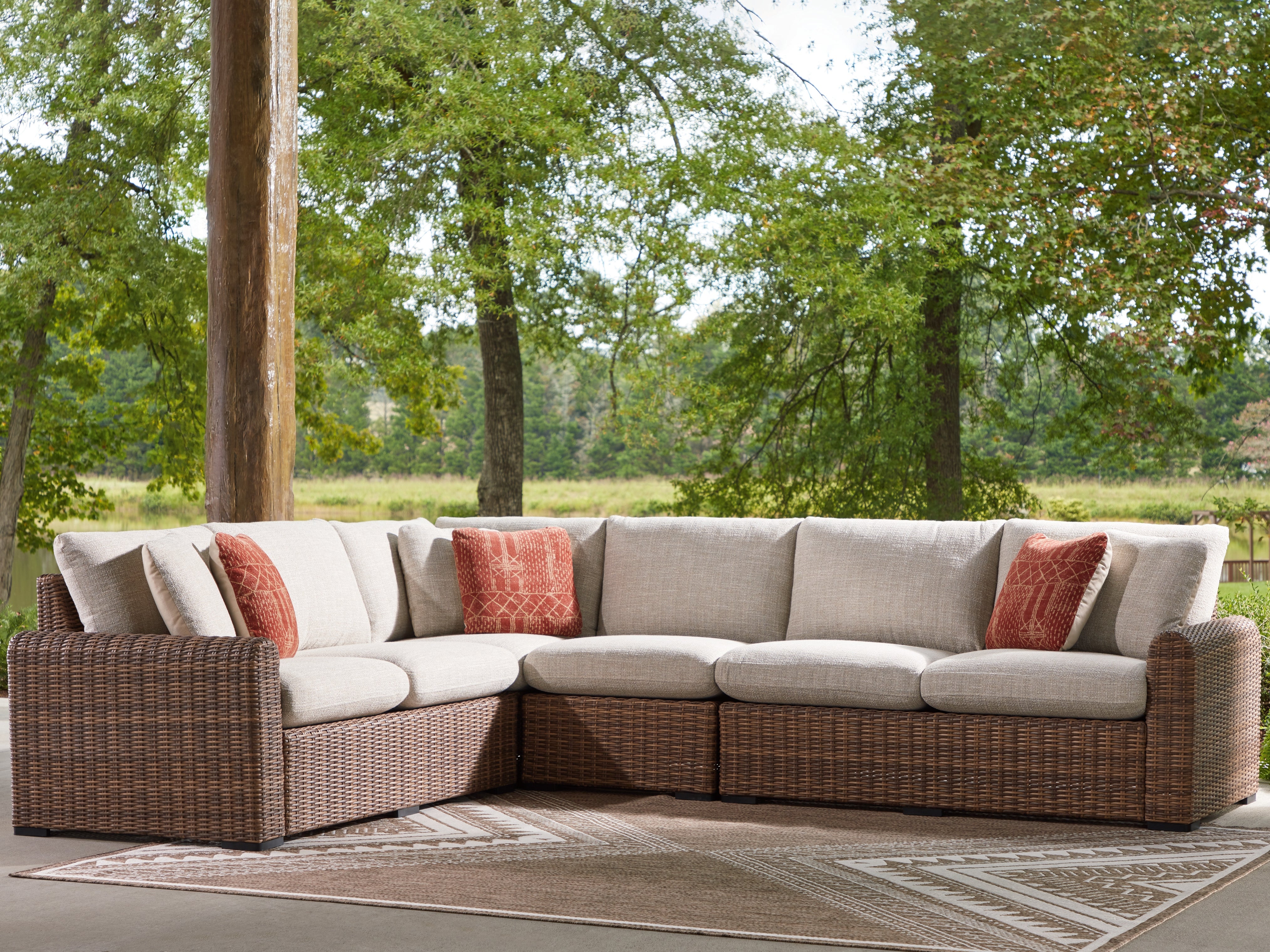 Coral Furniture - Ashley Furniture - Dolan Creek Outdoor - 4-Piece Outdoor Sectional / Beige/Brown - PCP610P2