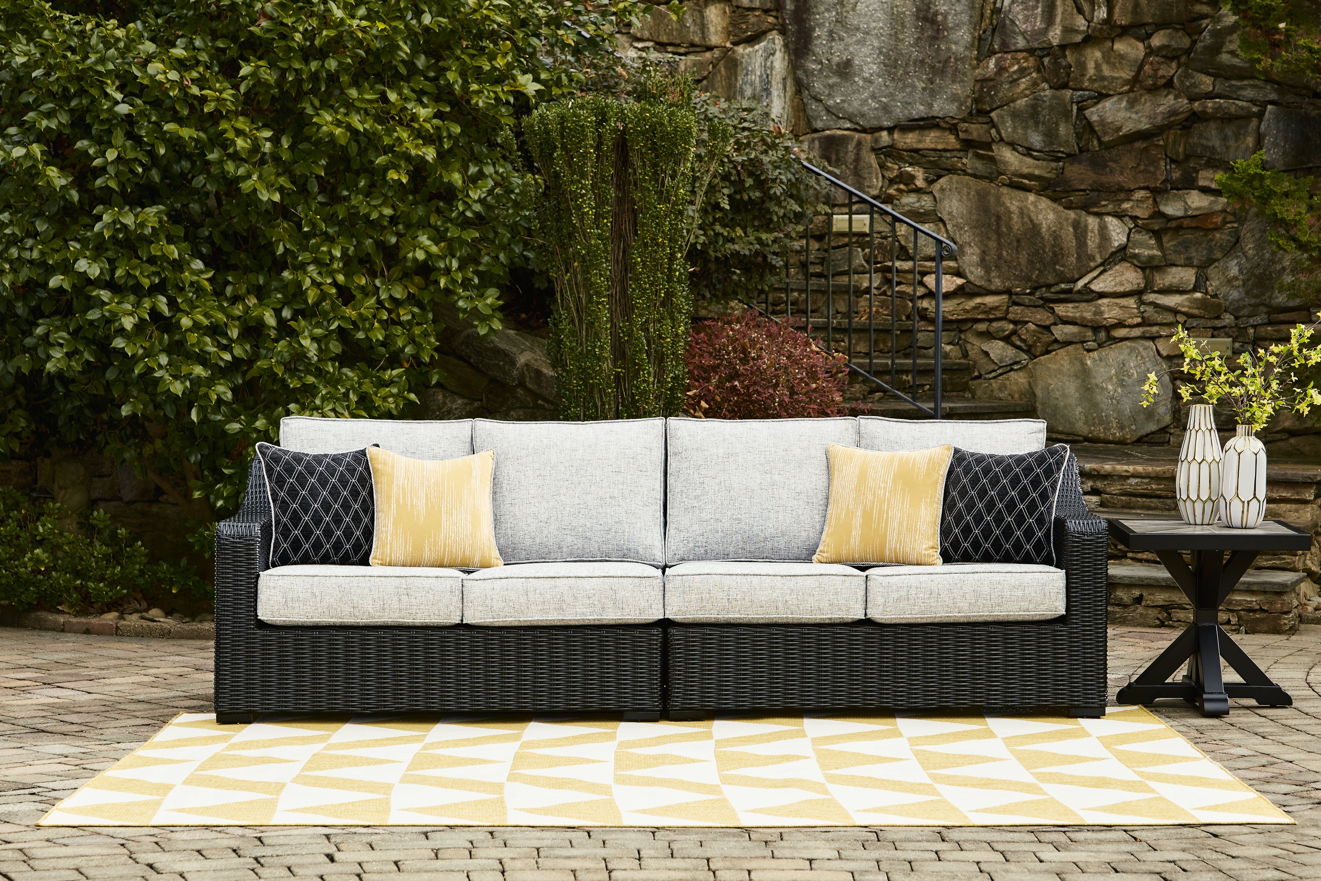 Coral Furniture - Ashley Furniture - Beachcroft Outdoor - RAF/LAF Loveseat w/CUSH (Set of 2) / Black/Light Gray - P792-854