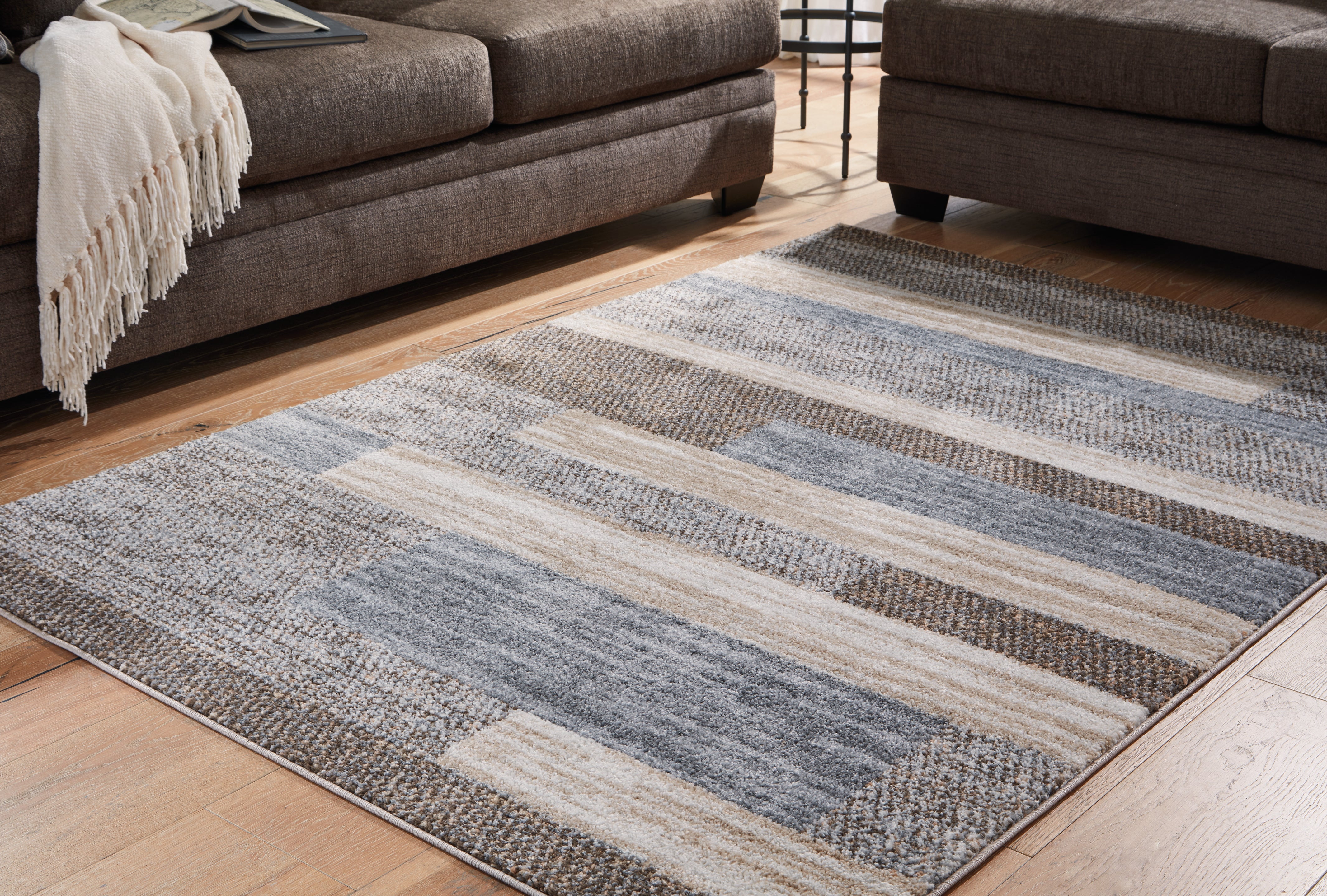 Coral Furniture - Ashley Furniture - Sethburn Rug - 8' x 10' Rug / Cream/Brown/Gray - R406591