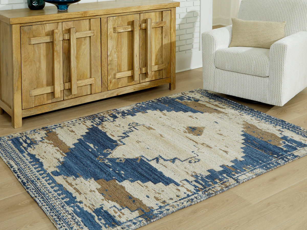 Coral Furniture - Ashley Furniture - Varnler Rug - 5' x 7' Rug / Blue/Brown/Tan - R407132