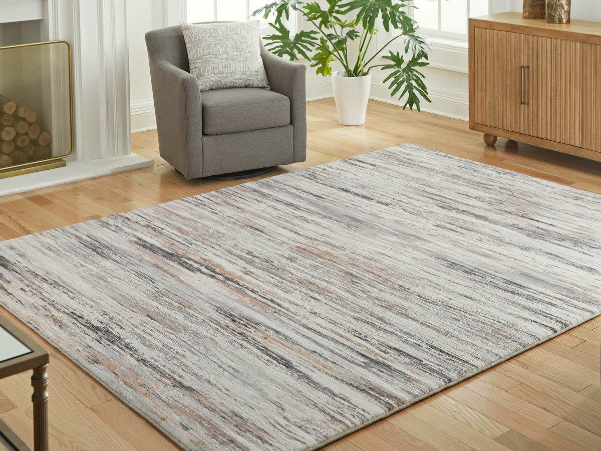 Coral Furniture - Ashley Furniture - Nace Rug - 5' x 7' Area Rug / Gray/Brown/White - R407472