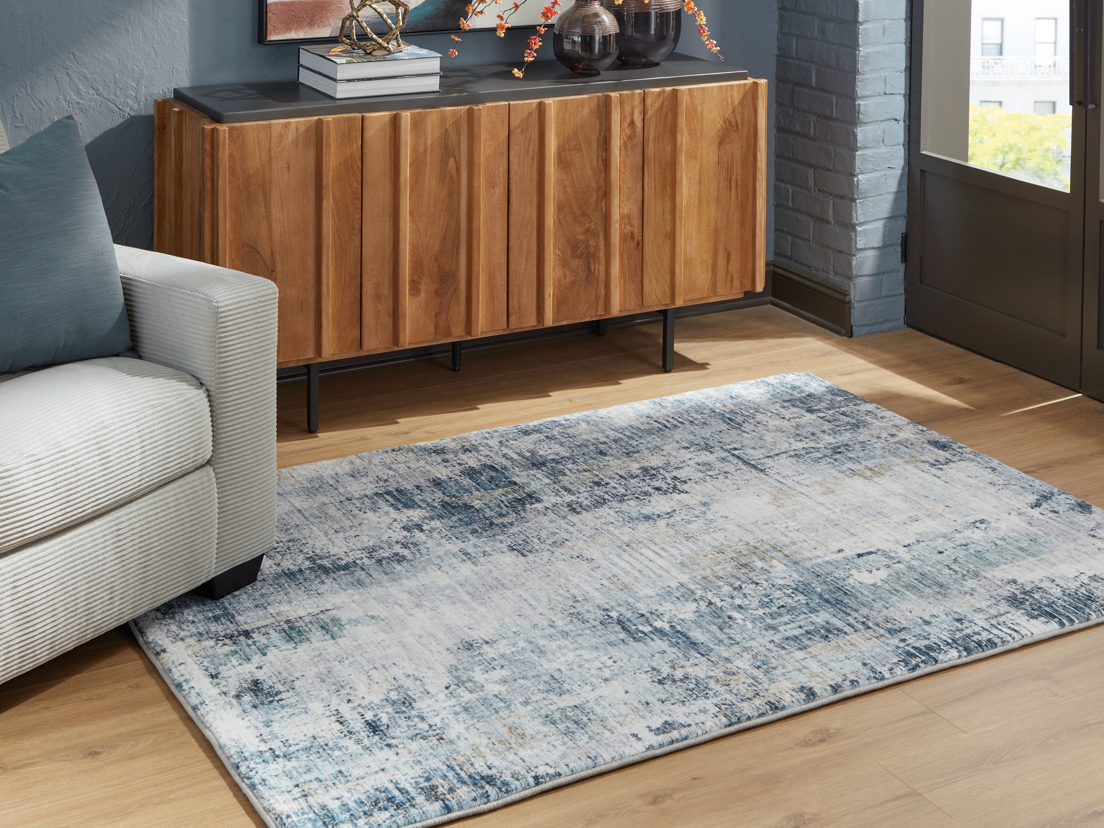 Coral Furniture - Ashley Furniture - Arlenmont Rug - 5' x 7' Area Rug / Blue/White/Brown - R407482