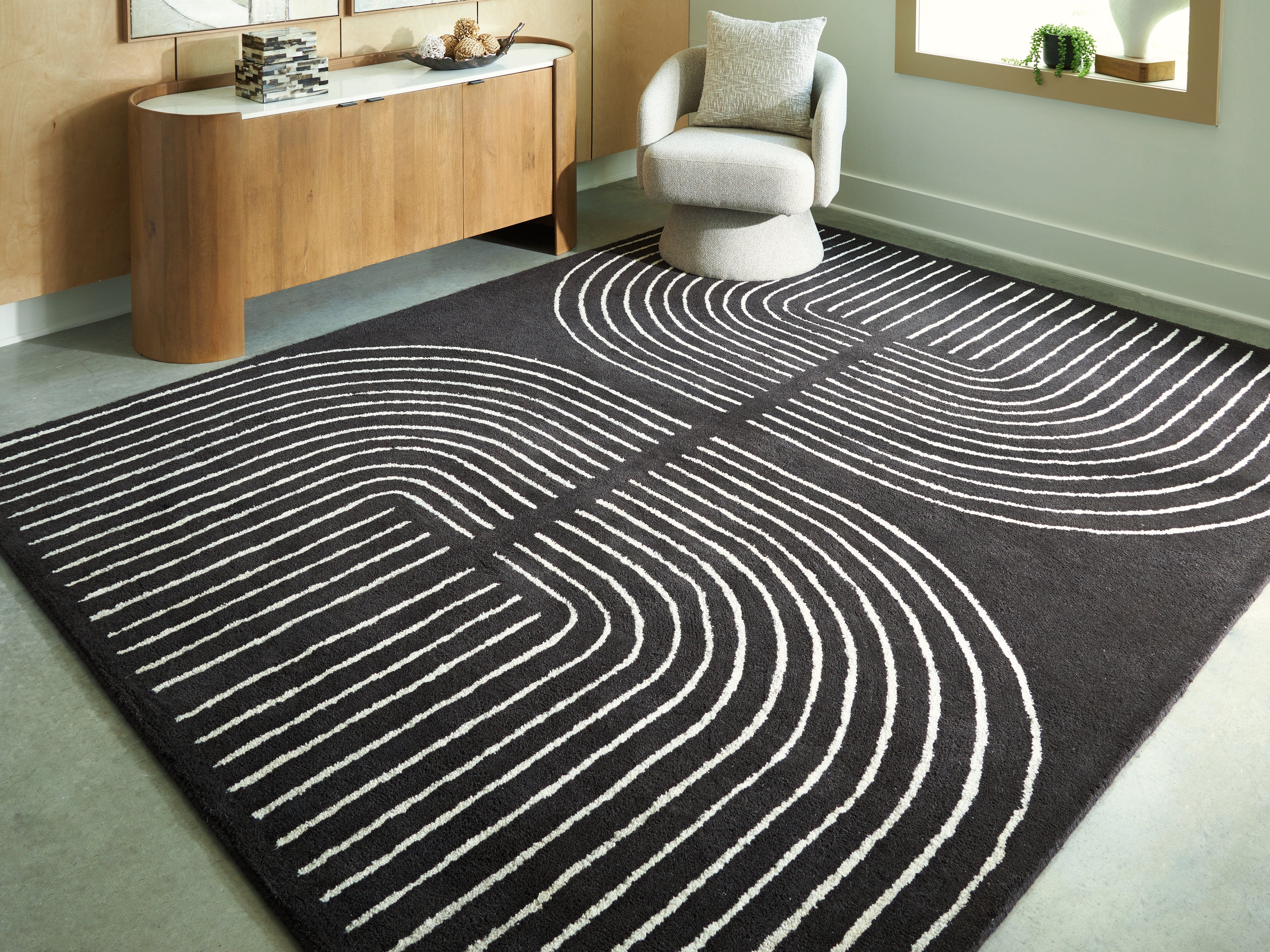 Coral Furniture - Ashley Furniture - Eldonmore Rug - 7'8" x 10' Area Rug / Black/Ivory - R407571