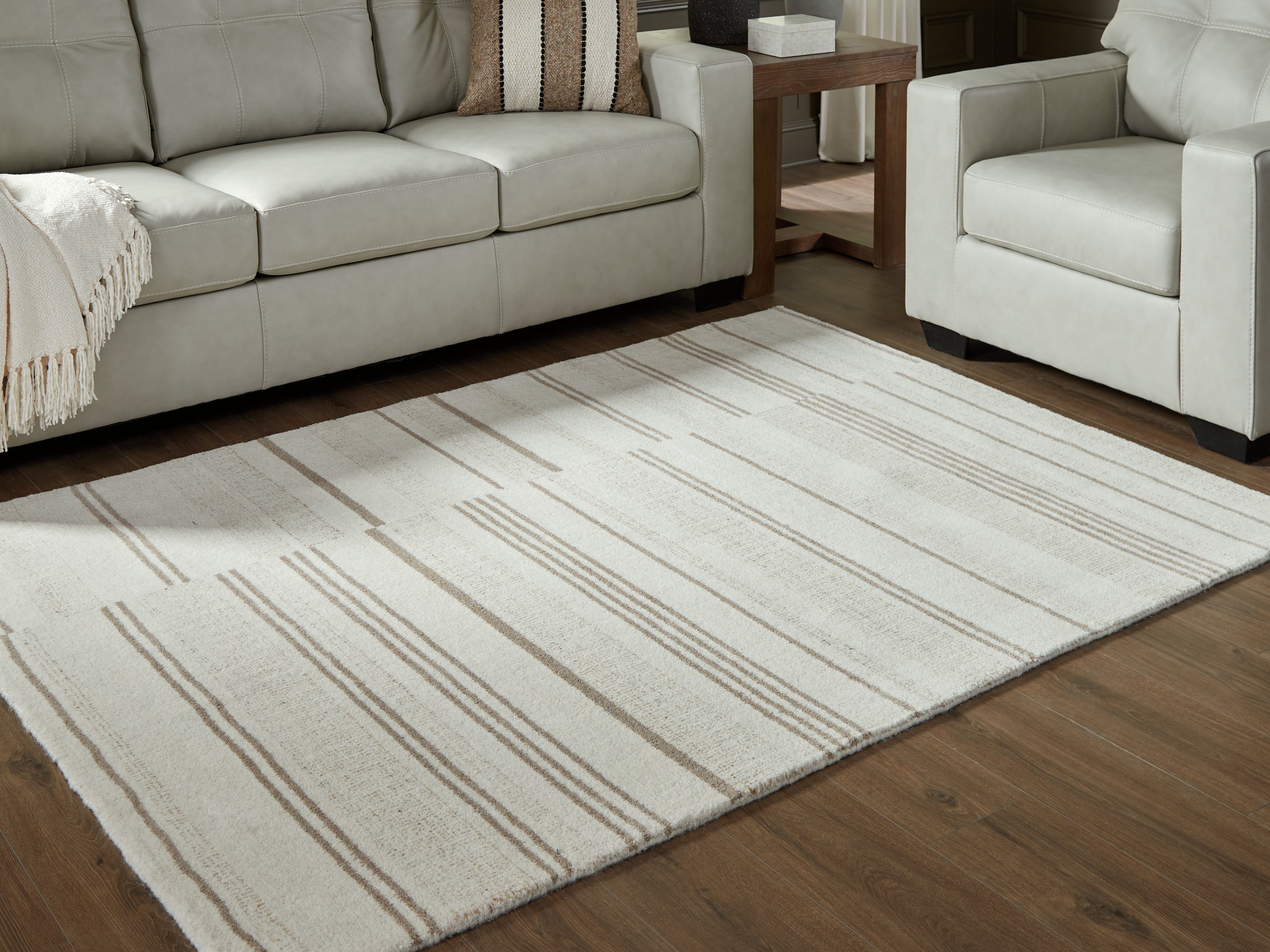 Coral Furniture - Ashley Furniture - Gadence Rug - 5' x 7' Area Rug / Ivory/Tan - R407642